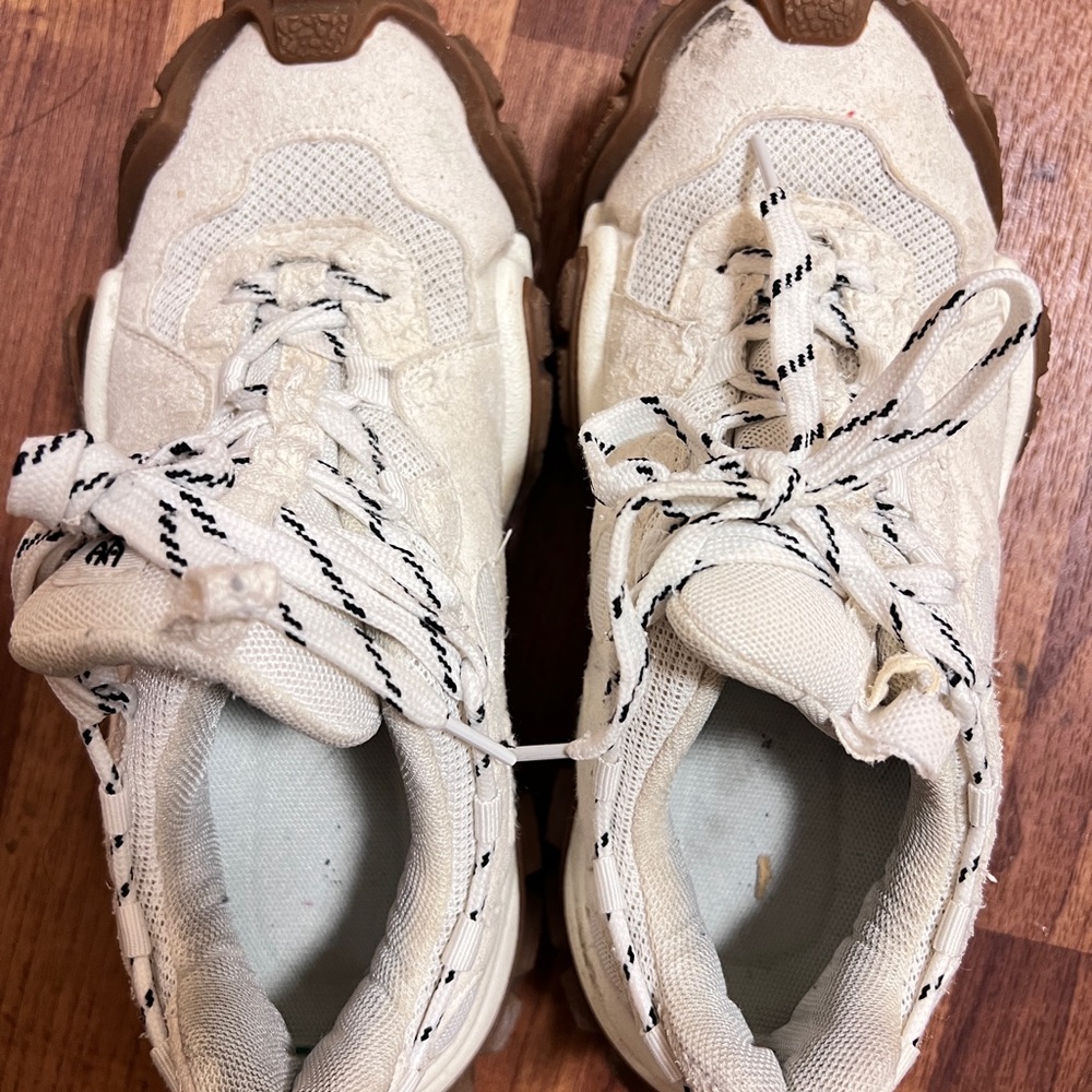 Brown and white sneakers